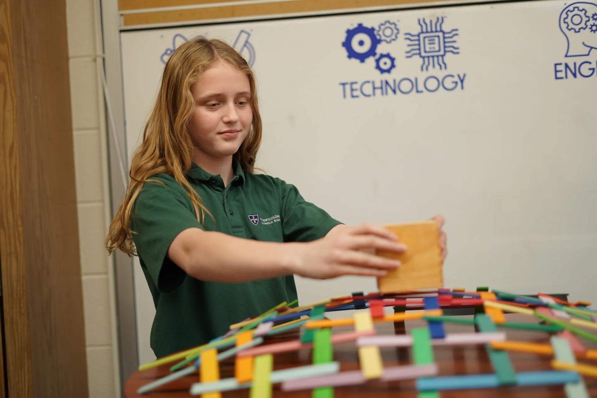girl building stick structure